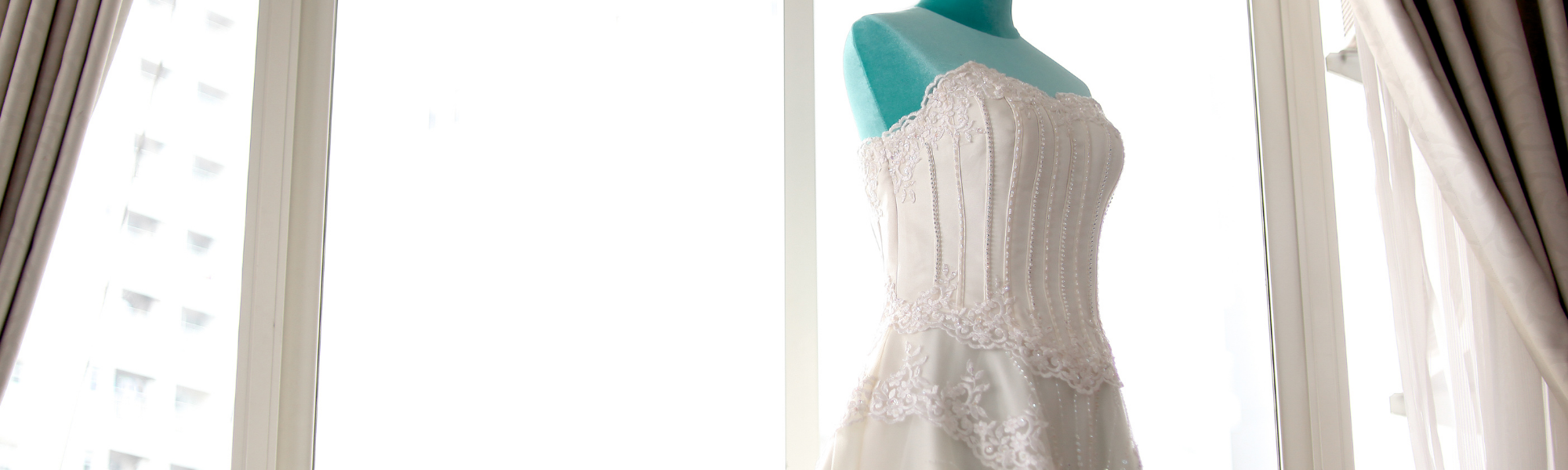 vintage wedding gown on a mannequin 